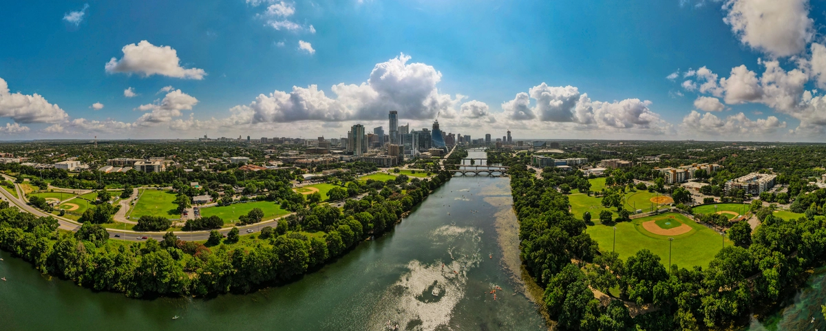 a panoramic drone image showing downtown austin from the west at Lou Neff point